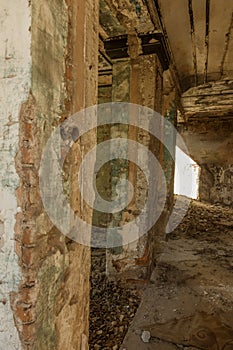 Mystical interior, ruins of an abandoned ruined building of house of culture, theater of USSR. Old destroyed walls, corridor with