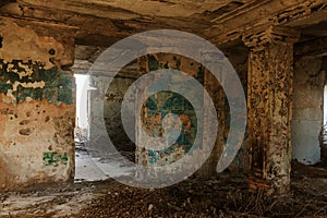 Mystical interior, ruins of an abandoned ruined building of house of culture, theater of USSR. Old destroyed walls, corridor with