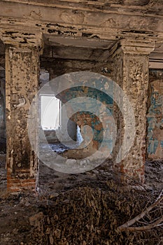 Mystical interior, ruins of an abandoned ruined building of house of culture, theater of USSR. Old destroyed walls, corridor with