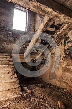 Mystical interior, ruins of an abandoned ruined building of house of culture, theater of USSR. Old destroyed walls, corridor with