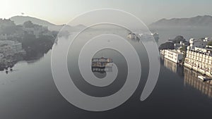 Mystical mood of Lake Pichola and islands palaces, Udaipur, India. Scenic aerial