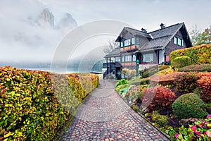 Mystical morning view of Altaussee village, district of Liezen in Styria, Austria. Foggy autumn scene of Altausseer See lake.