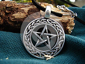 Mystical pentagram in circle with celtic symbol photo