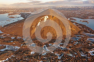 Mystical space drone view mountain and frozen lake pseudocraters. Myvatn in the north of Iceland