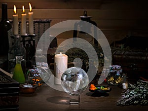 Mystical still life - the magic ball, candles, herbs. Many  items and utensils alchemist. Concept - , witch board, alternative