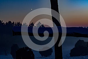 Mystical sunset behind cruzifix