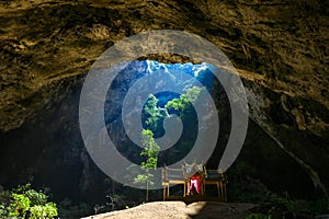 Mystique view to the Phraya Nakhon Cave with the Khuha Kharuehat Pavilion illuminated by Sun through the Hole in the Rocky Top