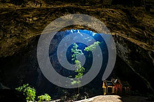 Mystique view to the Phraya Nakhon Cave with the Khuha Kharuehat Pavilion illuminated by Sun through the Hole in the Rocky Top