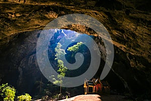 Mystique view to the Phraya Nakhon Cave with the Khuha Kharuehat Pavilion illuminated by Sun through the Hole in the Rocky Top