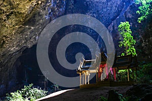 Mystique view to the Phraya Nakhon Cave with the Khuha Kharuehat Pavilion illuminated by Sun through the Hole in the Rocky Top