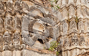 Myth figures on carved towers of 12th century temple, Thailand.