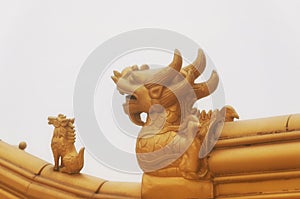 Mythical creatures atop temple emeishan