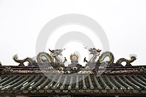 Mythical creatures statue on roof of Guandi shrine and Jinping Temple of Queen of Heaven at Shantou or Swatow in Guangdong, China photo