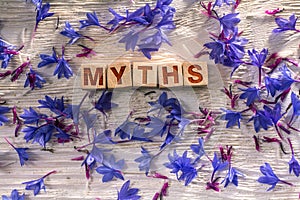 Myths on the wooden cubes photo