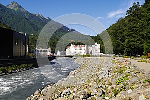 Mzymta River and hotel buildings in Rosa Khutor, Russia