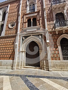 MÃ¡laga, Spain - JUNE 09, 2021: View of St. Tomas Hospital in Malga downtown