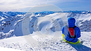 Mölltaler Gletscher - A skier sitting on the snow