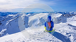 Mölltaler Gletscher - A skier sitting on the snow