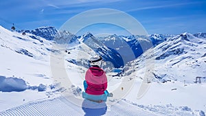 Mölltaler Gletscher - A snowboarder girl sitting on the snow