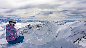 Mölltaler Gletscher - A snowboarder girl sitting on the snow