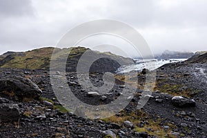 MÃ½rdalsjÃ¶kull glacier behind the hills