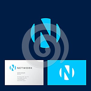 N letterin a circle. N logo, blue monogram, isolated on a dark background.