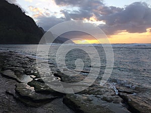 Na Pali Coast Cliffs during sunset on Kauai Island, Hawaii.