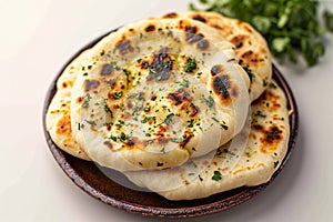 Naan perfection Nan bread served elegantly in an isolated plate