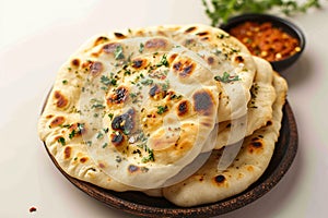 Naan perfection Nan bread served elegantly in an isolated plate