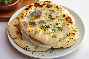 Naan perfection Nan bread served elegantly in an isolated plate