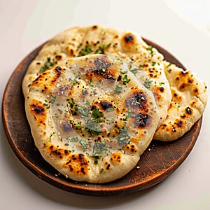 Naan perfection Nan bread served elegantly in an isolated plate