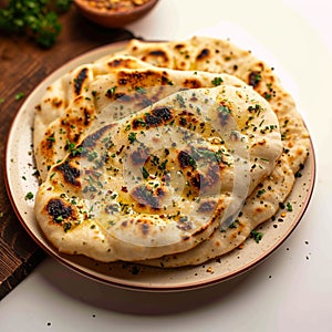 Naan perfection Nan bread served elegantly in an isolated plate