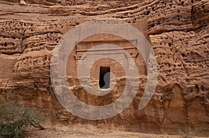 Nabatean tomb in MadaÃÂ®n Saleh archeological site, Saudi Arabia photo