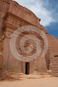 Nabatean tomb in MadaÃÂ®n Saleh archeological site, Saudi Arabia photo