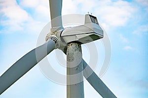 Nacelle of a wind turbine and cloudy sky