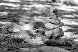 Naches River rocks stacked to create a cairn on the riverbank
