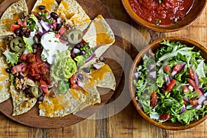 Nacho Cheese Tortilla chips with chili and salsa