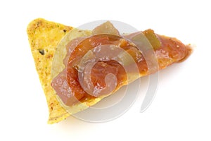 Nacho chip with salsa sauce photo