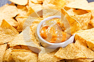 Nachos corn chips with cheese dip