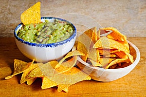 Nachos and guacamole photo