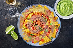 Nachos, Mexican food, tortilla chips with beef and fresh vegetables