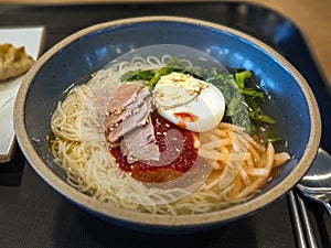 Naengmyeon, Korean cold noodle dish of long and thin handmade noodles.