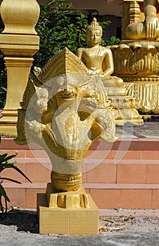 Naga gold dragon snake guard in thai buddhist Temple