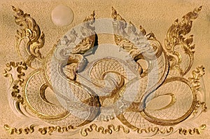 Naga stucco on the sandstone wall, which is beautiful and detailed