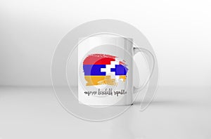 Nagorno Karabakh Republic flag on white coffee mug.