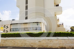 NAHARIYA, ISRAEL-MARCH 9, 2018: Residential building against a blue sky in Nahariya, Israel
