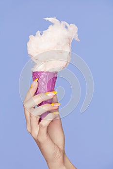 Nail Art. Hands With Colorful Nails And Cotton Sugar Ice Cream