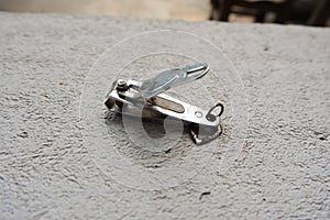 Nail clipper on stone background photo