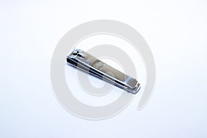 Nail clippings on a white background, isolated white photo