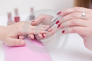 Nail manicure in a beauty salon